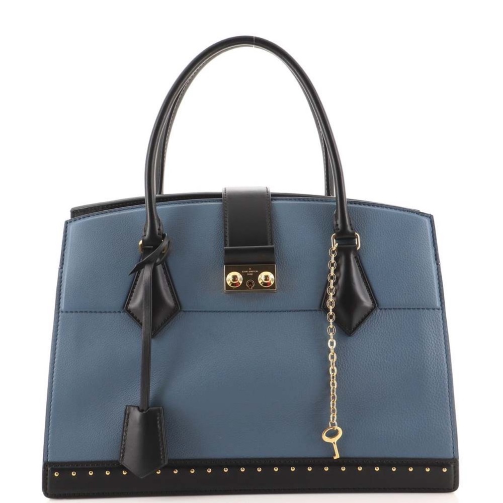 Louis Vuitton Cour Marly Handbag